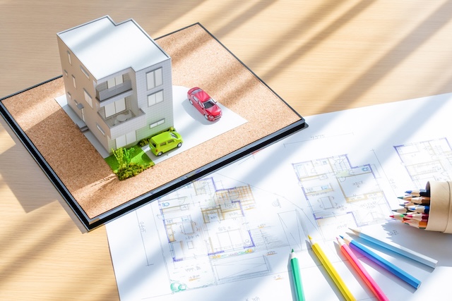 注文住宅の住宅模型と設計図